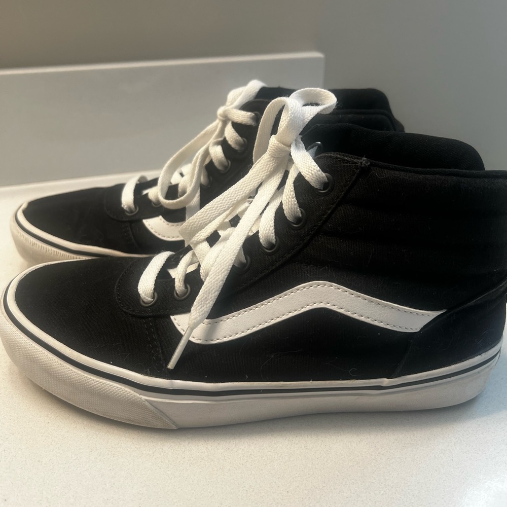 Women’s size 8.5 Vans Black Canvas High-Tops with White Stripe